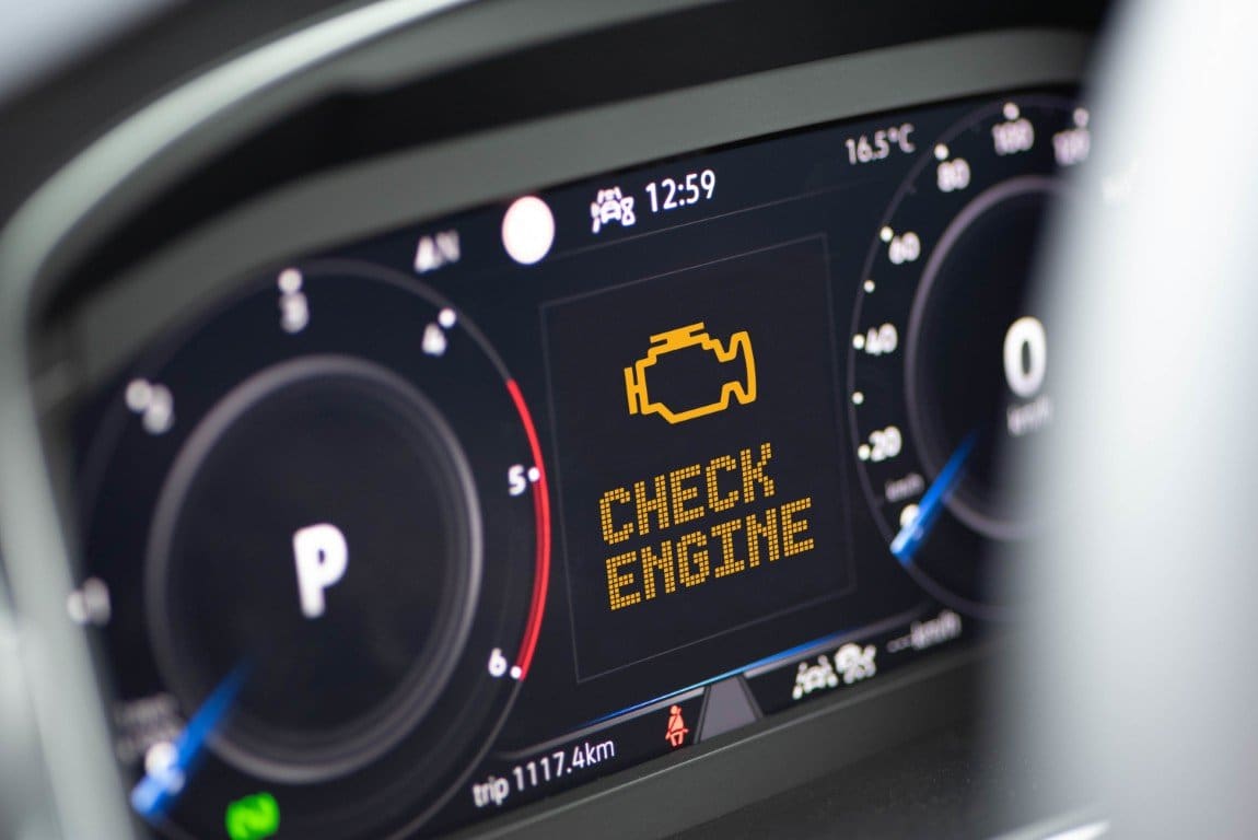 Illuminated check engine light on a modern vehicle instrument cluster